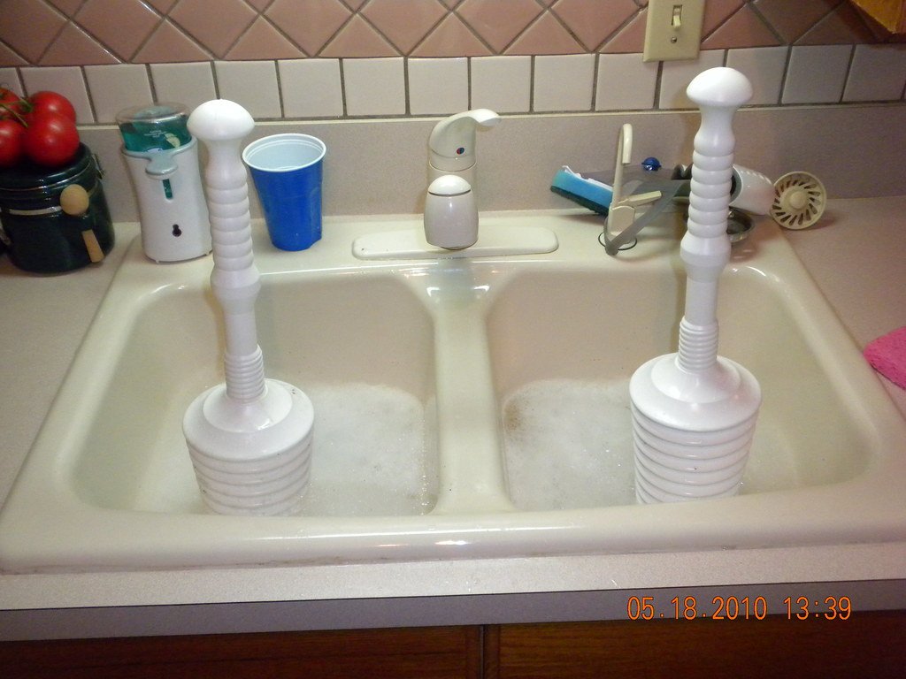 How to unblock a sink without damaging pipes